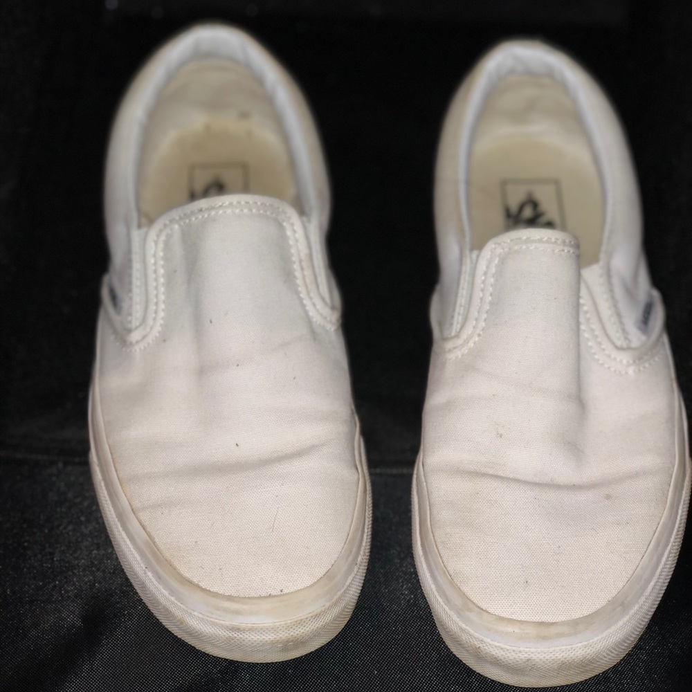 white slip on vans man size 7/ women 8.5